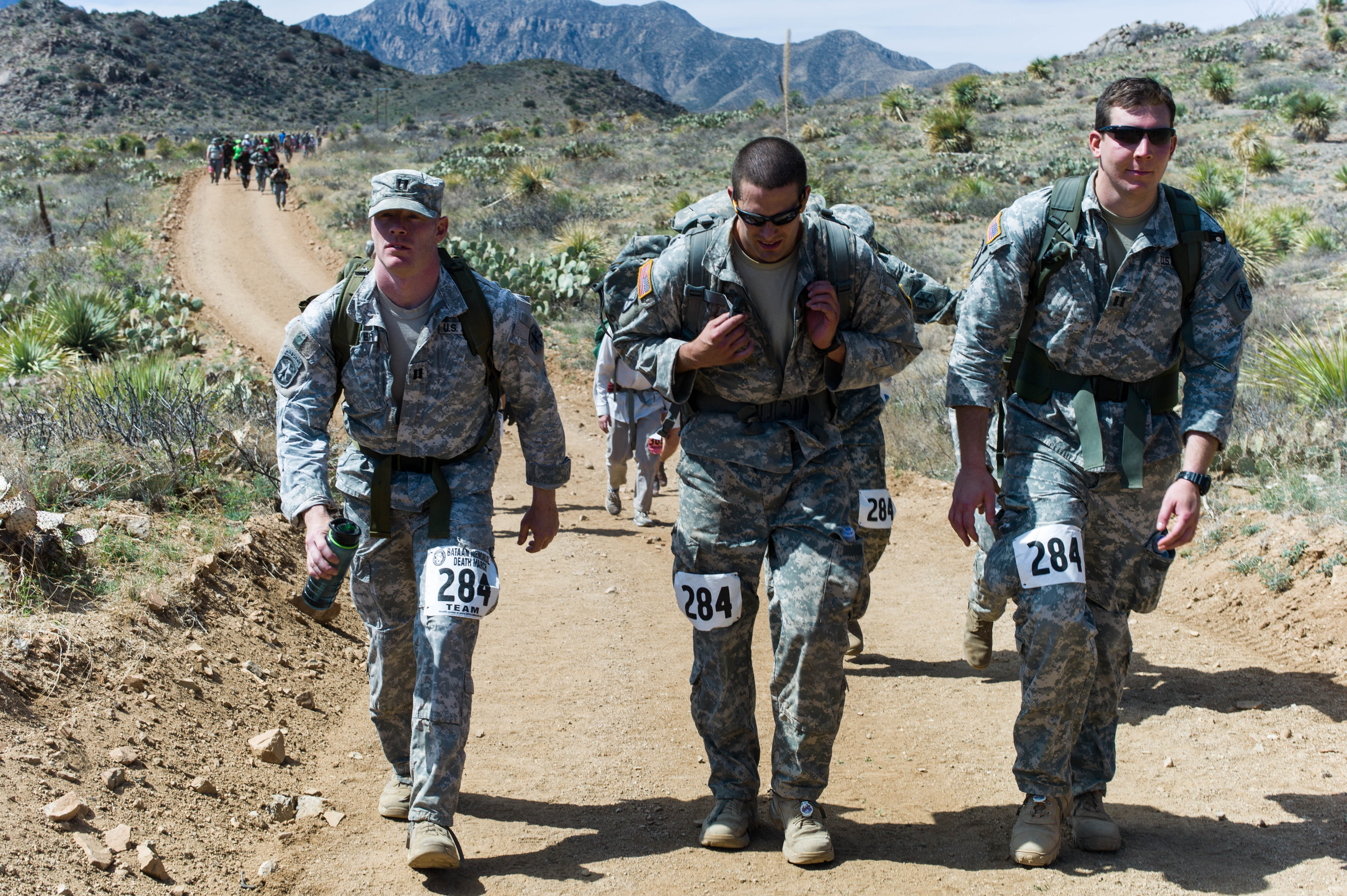 20120327-A-RE761-007: Capt. Aaron K. Smith, a member of the 81st Civil Affairs Battalion, 85th Civil Affairs Brigade ‘Tribal Endurance’ Team leads the way at mile 17 during the 23rd Annual Bataan Memorial Death March held March 25 at the U.S. Army White Sands Missile Range in New Mexico. The ‘Tribal Endurance’ team officially placed third overall in the military male heavy team division with each member carrying a rucksack weighing at least 35lbs. The ‘Tribal Endurance’ team is also officially the highest placing male heavy division team based out of Fort Hood. (Photo by Staff Sgt. Michael J. Dator, 85th Civil Affairs Brigade Public Affairs)