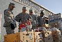 Soldiers from Fort Hood helped distribute 1,200 Thanksgiving dinner meals to Soldiers and their Families during a distribution event held at the Killeen Food Care Center Nov. 20. (Photo by Staff Sgt. David House, 85th Civil Affairs Brigade Public Affairs)
